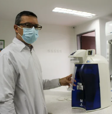 Photo showing a member of one of the research groups working in one of the laboratories.