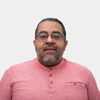 The photo was taken in close-up, on a white background, with the professor Angel melendez in the center.