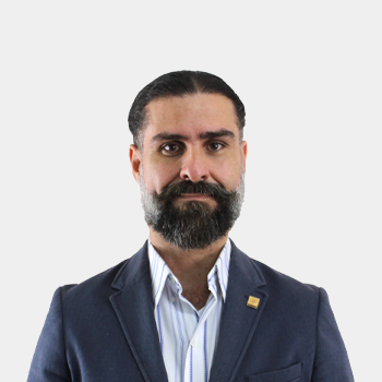Fotografía frontal del profesor Carlos Jesus Muvdi