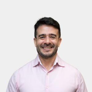 The photo was taken in close-up, with a white background, and the profesor Andres Botero Bernal is situated in the center.