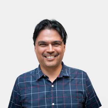 The photo was taken in the foreground, white background and the professor John Jairo Marquez is located in the center.
