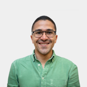 The photo was taken in the foreground, white background and the professor Jose Miguel Benjumea is located in the center.