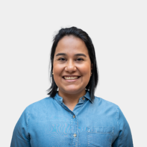 The photo was taken in the foreground, white background and the professor Tatiana Guarin Corredor is located in the center.